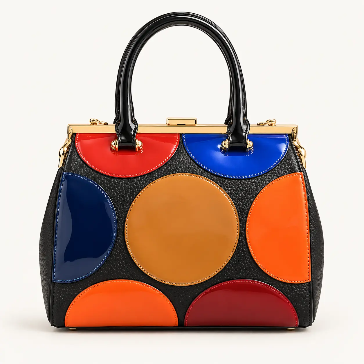 Sac noir à motifs géométriques colorés bleu, orange, rouge et cognac
