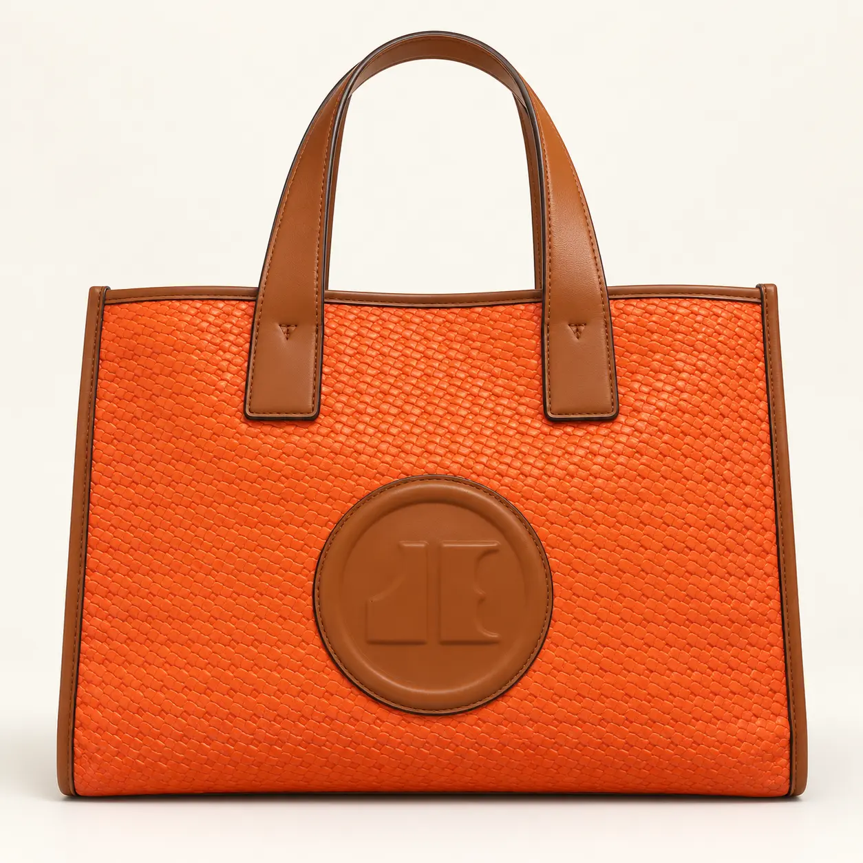 Grand cabas orange texturé avec médaillon rond cognac